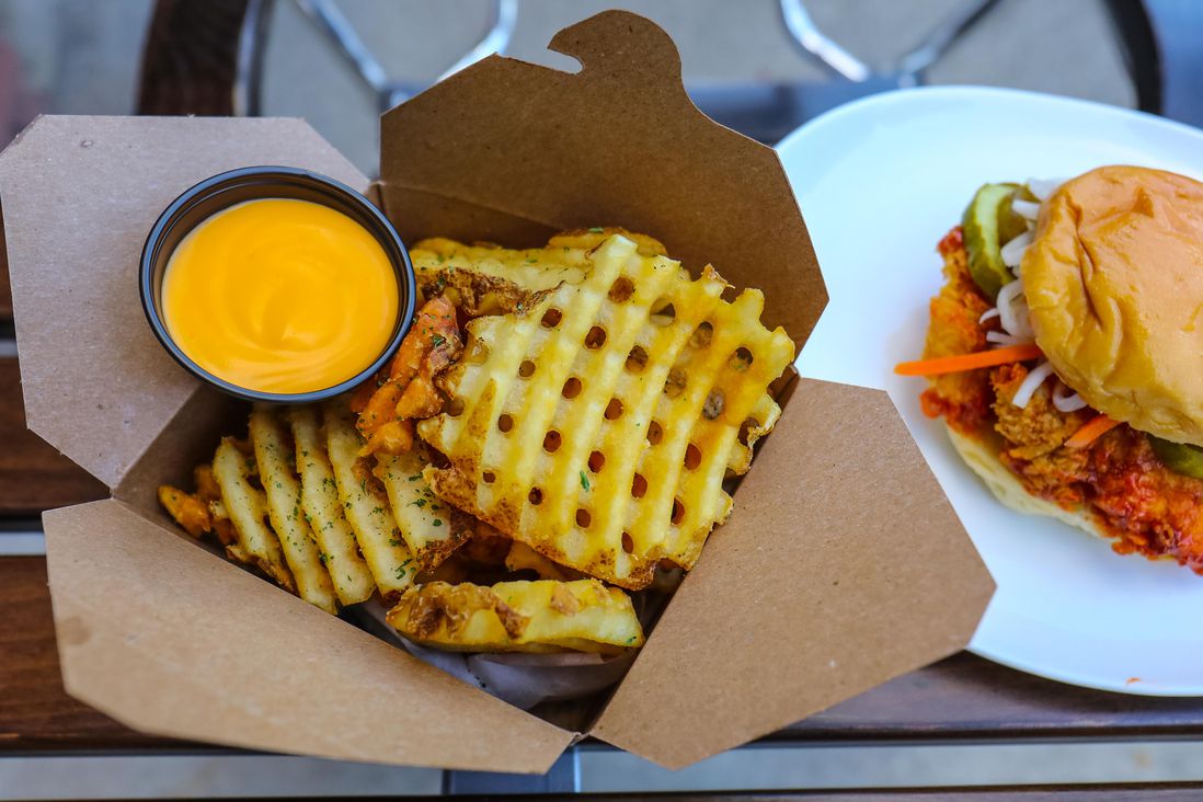 Waffle Fries with Nacho Cheese sauce ($4.99)